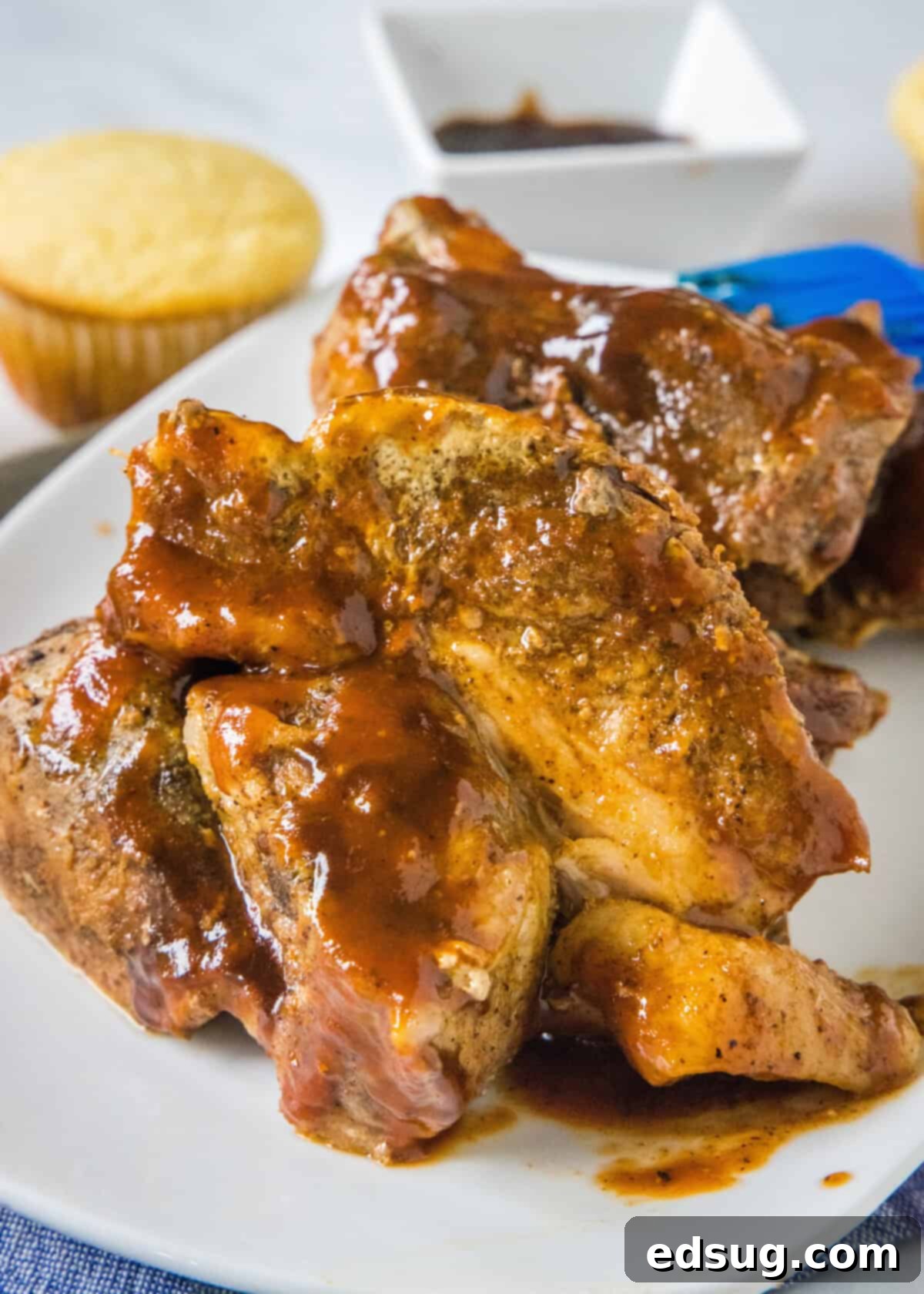 Fall Off The Bone Slow Cooker Country Ribs 7 looking down on a plate of country style ribs