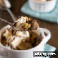 Deep Dish Chocolate Chip Cookies for Two -An ooey, gooey, chocolate-y deep dish cookie that makes just enough for two people.  A homemade version of the famous Pizookie.