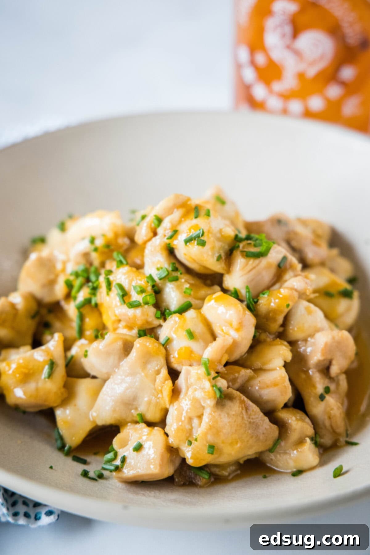 honey sriracha chicken bites in a serving bowl