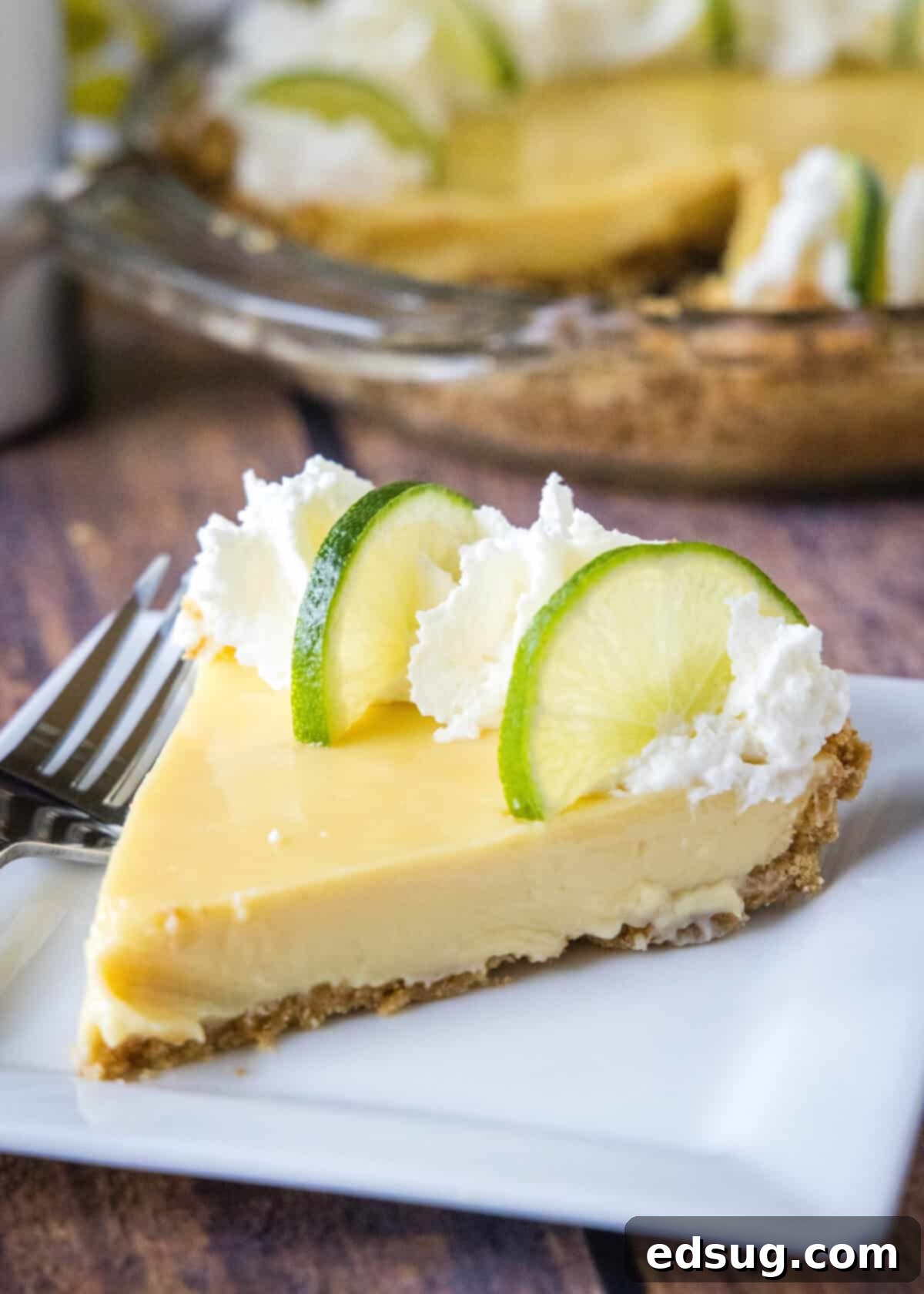 slice of key lime pie on a white plate