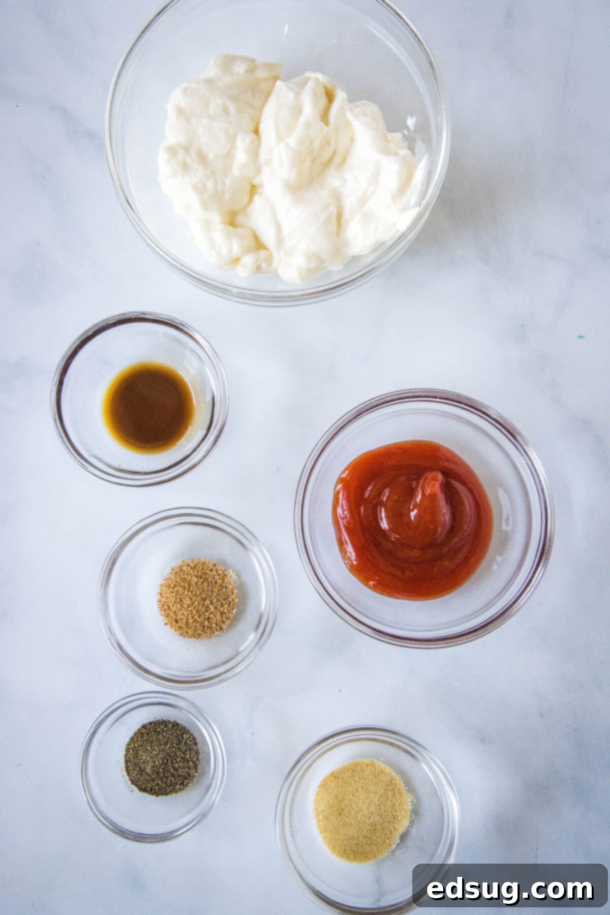 Copycat Canes Sauce Recipe 3 all ingredients for canes sauce laid out on a table