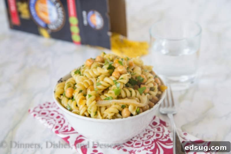 Flavorful Middle Eastern Pasta Salad 3 Middle Eastern Pasta Salad served in a white bowl with fresh parsley garnish