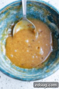 peanut dipping sauce in blue bowl