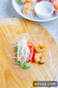 filling rice paper with vegetables