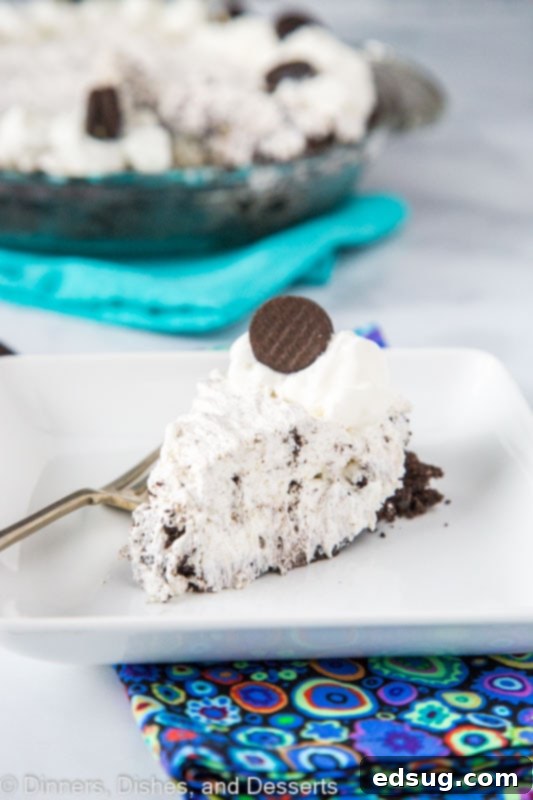 Irresistible No-Bake Oreo Delight 2 A beautifully set no-bake Oreo cheesecake with a distinct Oreo crust and creamy, speckled filling.