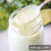 Signature Cafe Rio Dressing 7 close up spooning cafe rio dressing out of a jar