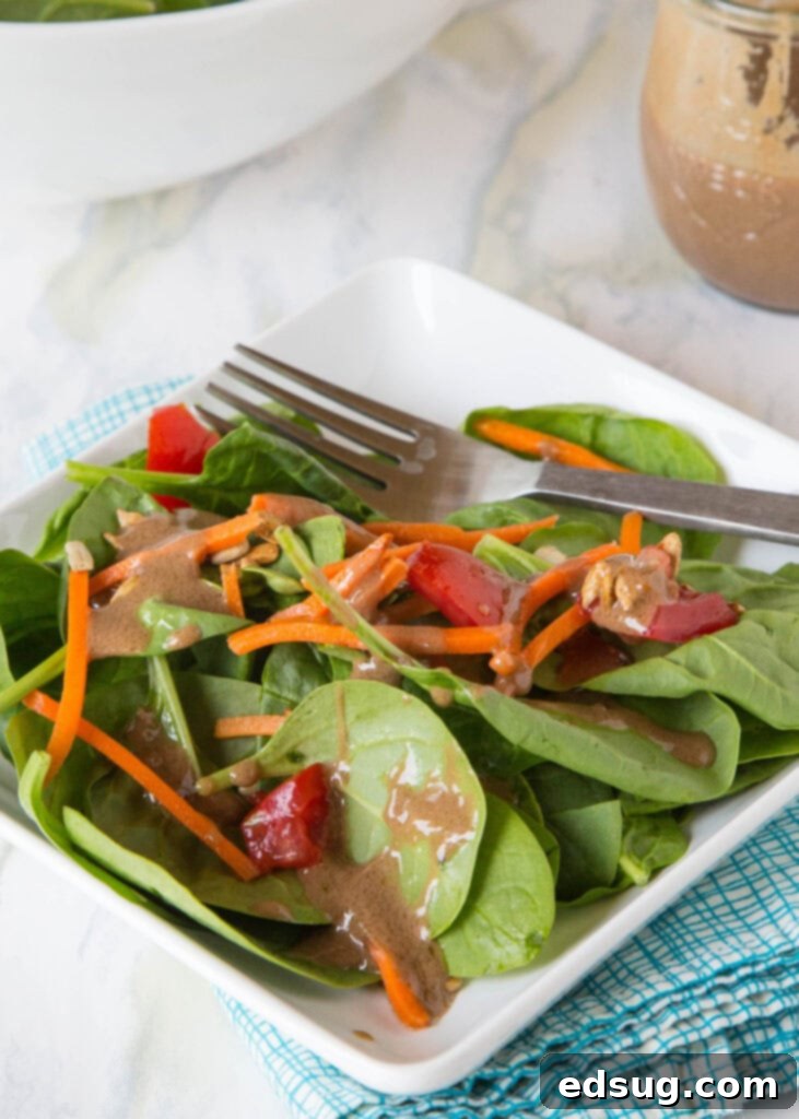salad with creamy balsamic dressing on it