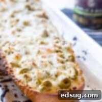 garlic olive cheese bread on a plate