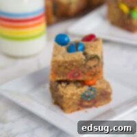 M&M's Peanut Butter Bars 2 A delicious M&M Peanut Butter Bar on a plate, ready to be enjoyed