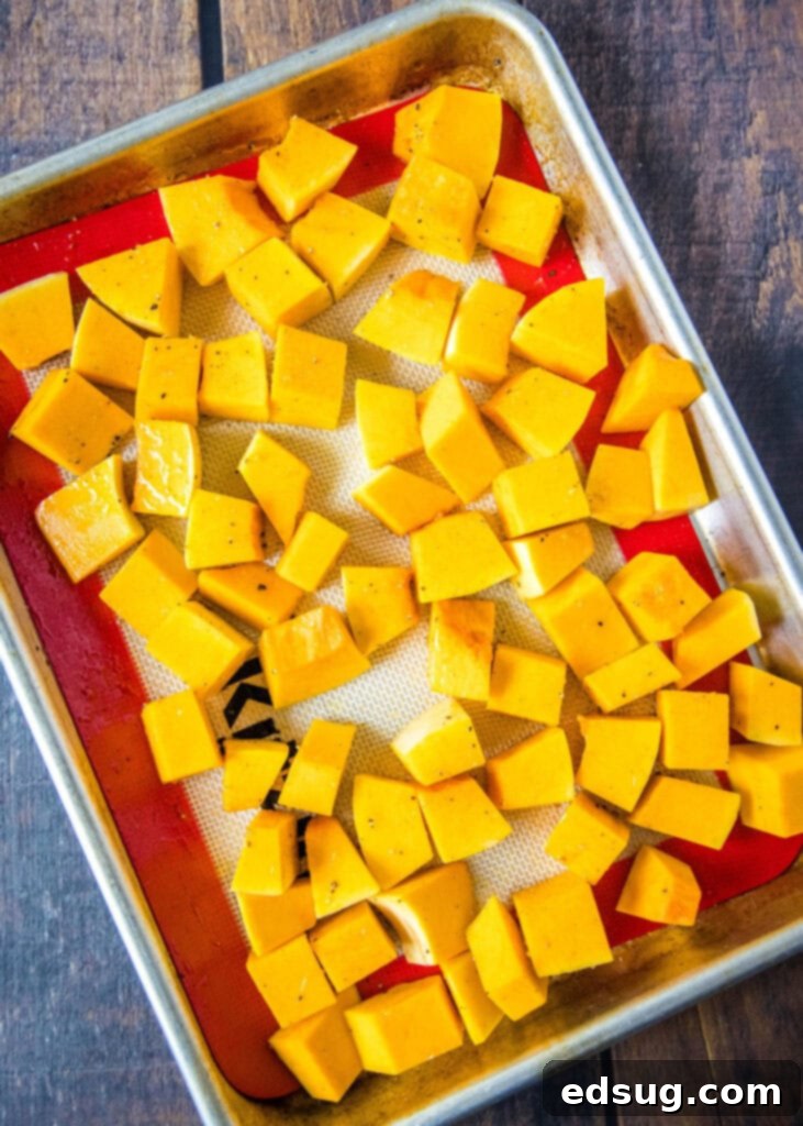 chopped squash on a baking tray
