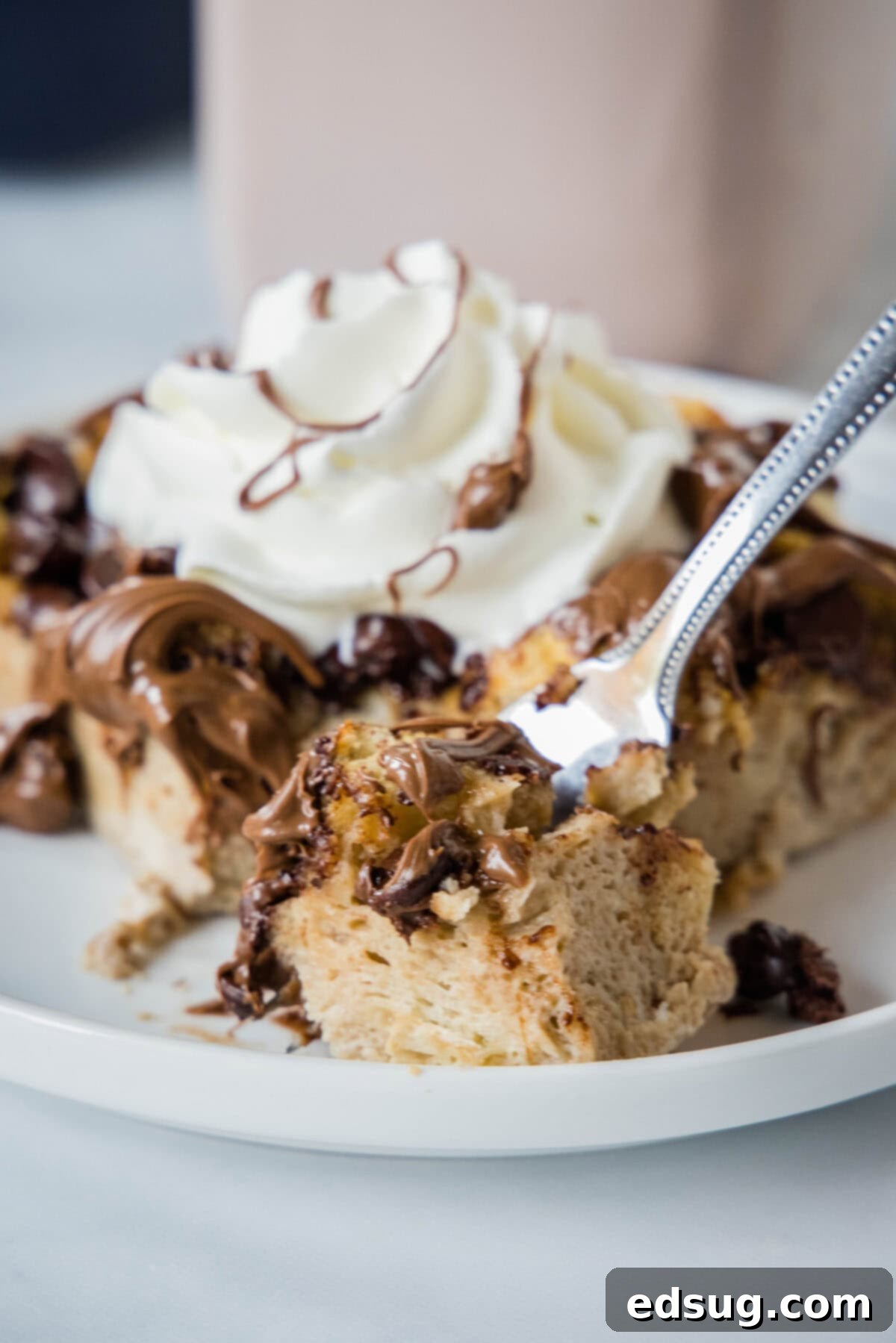 Decadent Chocolate French Toast Bake 7 bite of chocolate french toast on a fork