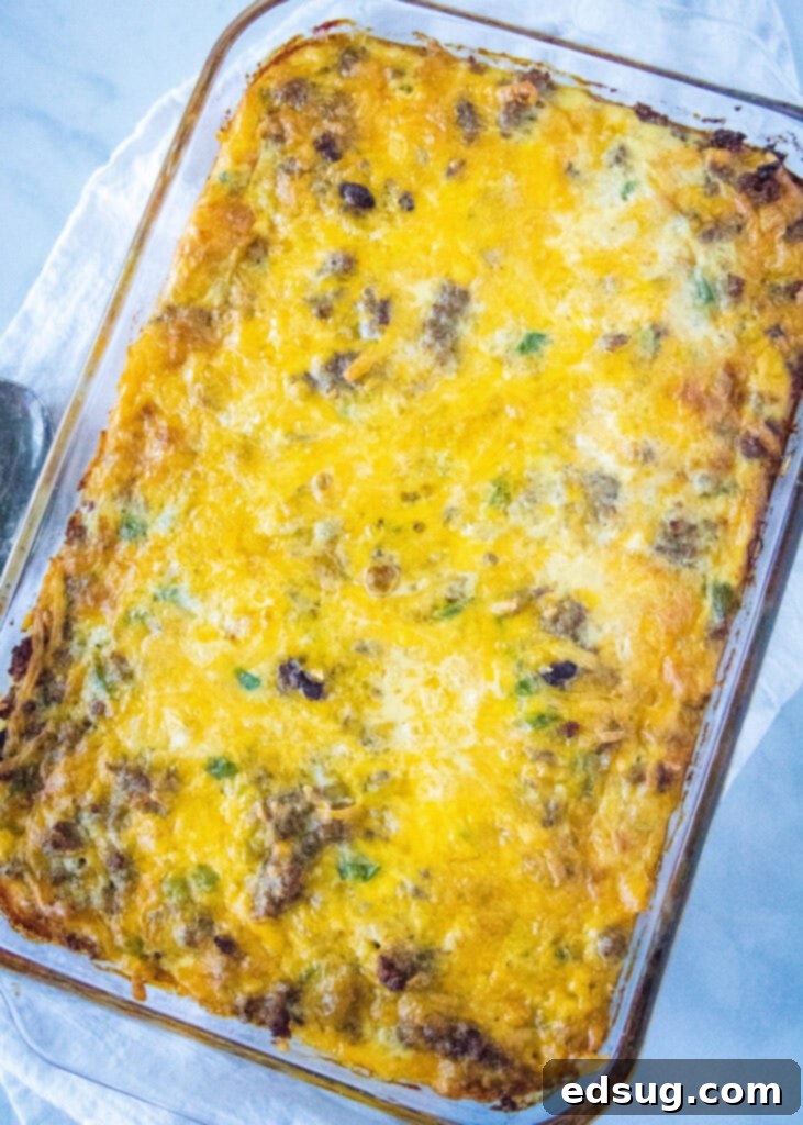 Top-down view of a baked sausage breakfast casserole fresh from the oven