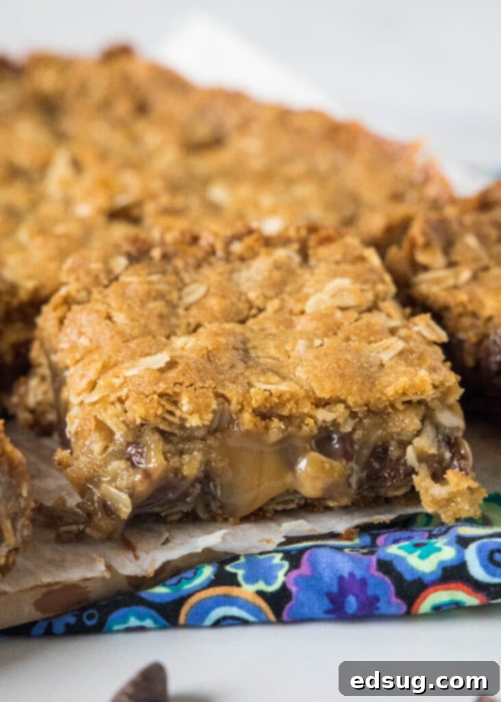 Chewy Caramel Bars 5 Neatly sliced Caramelitas on a wooden cutting board, ready to serve or store