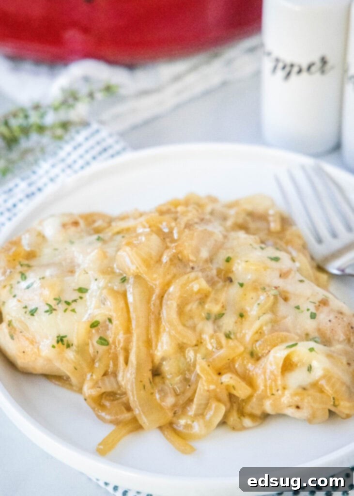 Caramelized French Onion Pork Chops 6 French onion pork chops on a plate with a fork, ready to eat