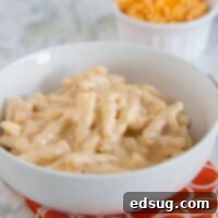 Creamy Slow Cooker Mac and Cheese 6 Slow Cooker Macaroni and Cheese - a creamy, cheesy, macaroni and cheese that is made completely in the crock pot!