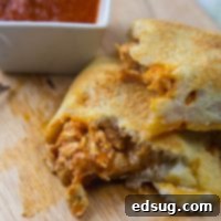 Ultimate Chicken Parmesan Calzones 5 chicken calzone on a plate