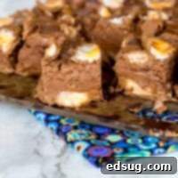 Creme Egg Fudge - the famous Cadbury Creme Eggs get mixed in with a rich and chocolate-y fudge to make it perfect for Easter.