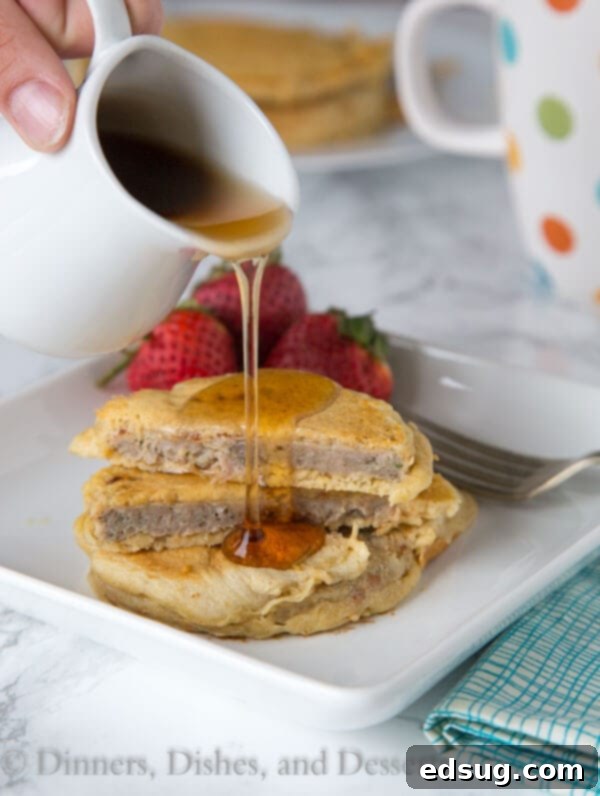 Savory Sausage Pancakes 2 sausage pancakes on a plate