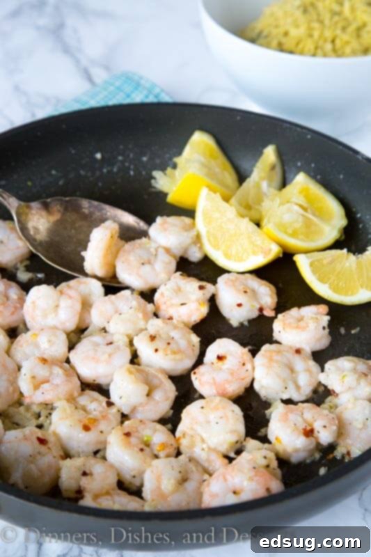 Bright Lemon Pepper Shrimp Scampi 2 lemon pepper shrimp in a pan