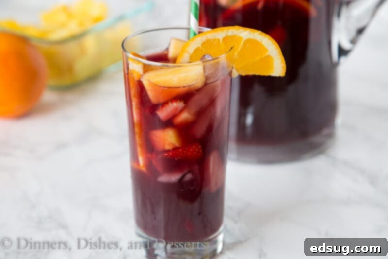 Close-up of a glass of easy red wine sangria with colorful fruit