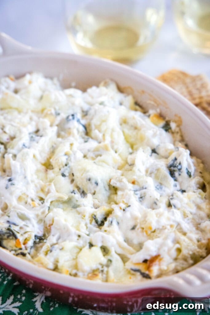 Creamy Spinach Artichoke Dip 6 baked spinach and artichoke dip in an elegant baking dish