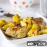 Jerk Chicken with Pineapple Salsa - a spicy and sweet grilled chicken recipe that comes together quickly.