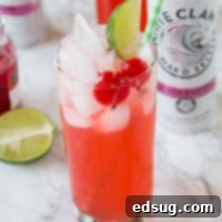 Black Cherry Limeade - a fun and easy cocktail recipe! Add a little sweetness to your limeade with Black Cherry Hard Seltzer.