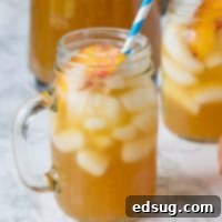 Refreshing Peach Tea Punch 5 Peach Tea Punch - a refreshing and summery punch that is perfect for hot days! And even better with fresh summer peaches.