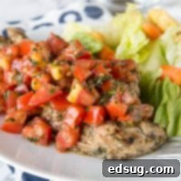 Bruschetta Chicken - chicken marinaded and grilled, then topped it tomato and garlic bruschetta. Healthy, quick, easy, and delicious!