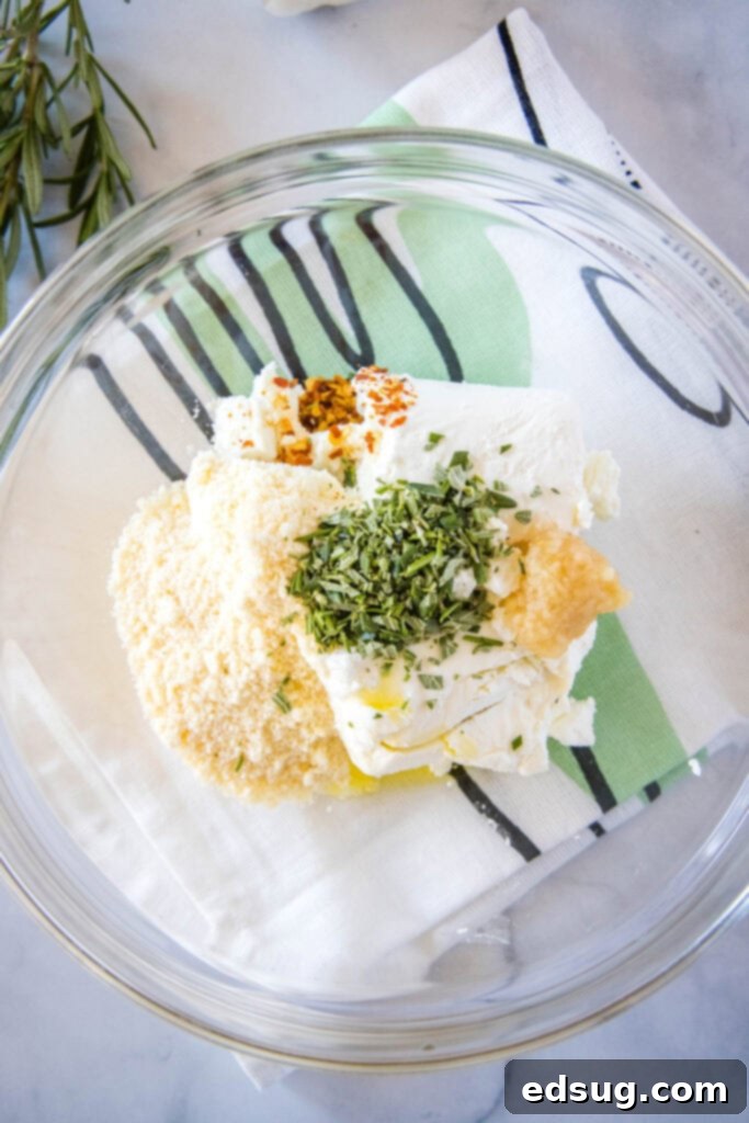 Warm, Tangy Goat Cheese Dip 4 mixing bowl with goat cheese ingredients in it