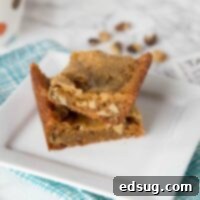 Walnut Blondies - rich and butter blondies filled with walnuts. The perfect treat to enjoy with a cup of tea!