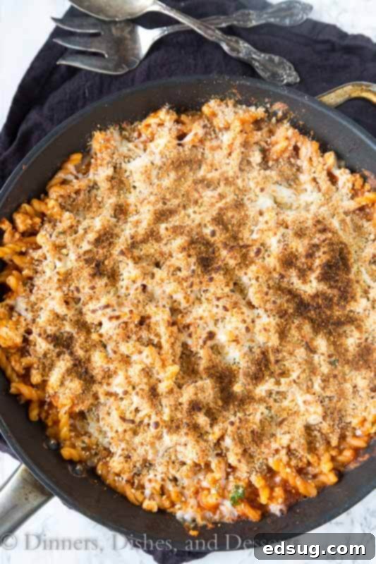 chicken parmesan past skillet oin a pan