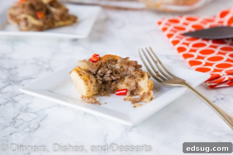 Philly Steak and Cheese Pinwheels 3 A plate of freshly baked Philly Cheese Steak Roll Ups, showcasing the delicious golden crust and cheesy filling.