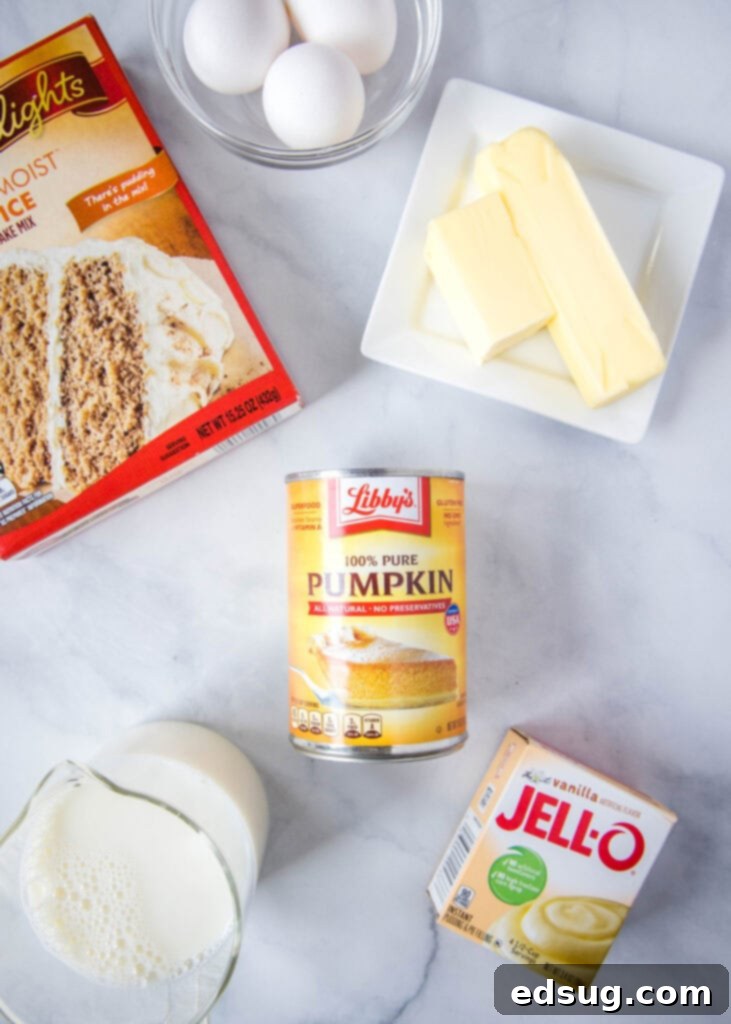 Gooey Pumpkin Crumble Delight 3 pumpkin dump cake ingredients laid out on a table