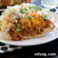 Cheesy BBQ Chicken French Bread Boats 5 barbecue chicken stuffed french bread on a plate