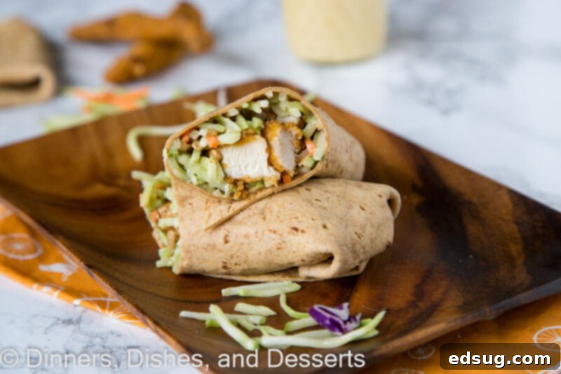 honey sesame chicken wraps on a plate