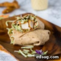 Honey Sesame Chicken Salad Wraps - Broccoli slaw coated in a creamy honey sesame dressing. Wrapped with crispy chicken for a quick and easy meal.