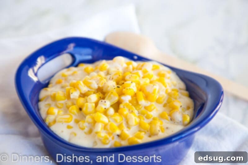 Velvety Slow Cooker Cream Corn 3 A bowl of food on a plate, with Dinner and Creamed corn
