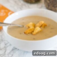 Creamy Mushroom Soup - a steaming, comforting bowl of homemade mushroom soup. Plus you can can (or freeze) the base for a quick batch of soup any day of the week!