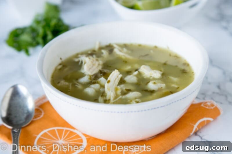Effortless Slow Cooker Verde Chicken Pozole 3 Verde chicken pozole in a bowl