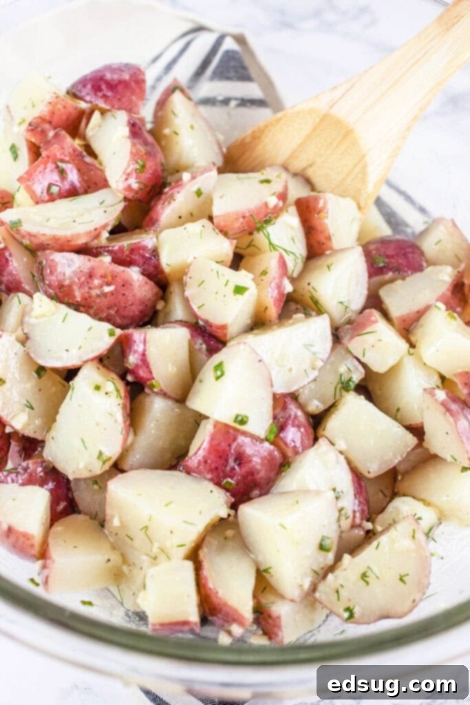 Zesty Lemon-Herb Potato Salad 4 tossing potatoes with lemon dressing