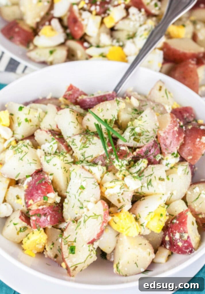 Zesty Lemon-Herb Potato Salad 5 lemon herb potato salad in a white bowl
