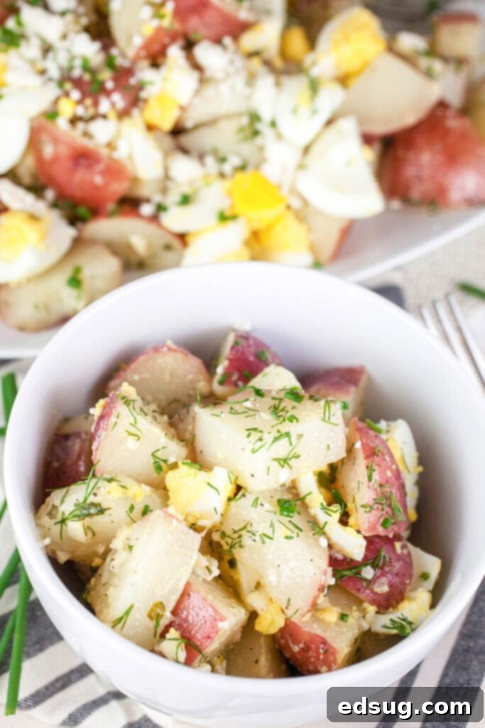 Zesty Lemon-Herb Potato Salad 6 healthy potato salad in a small white bowl