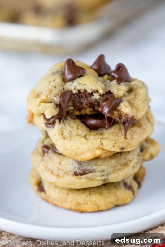 Irresistible chocolate chip cookies stacked on a table