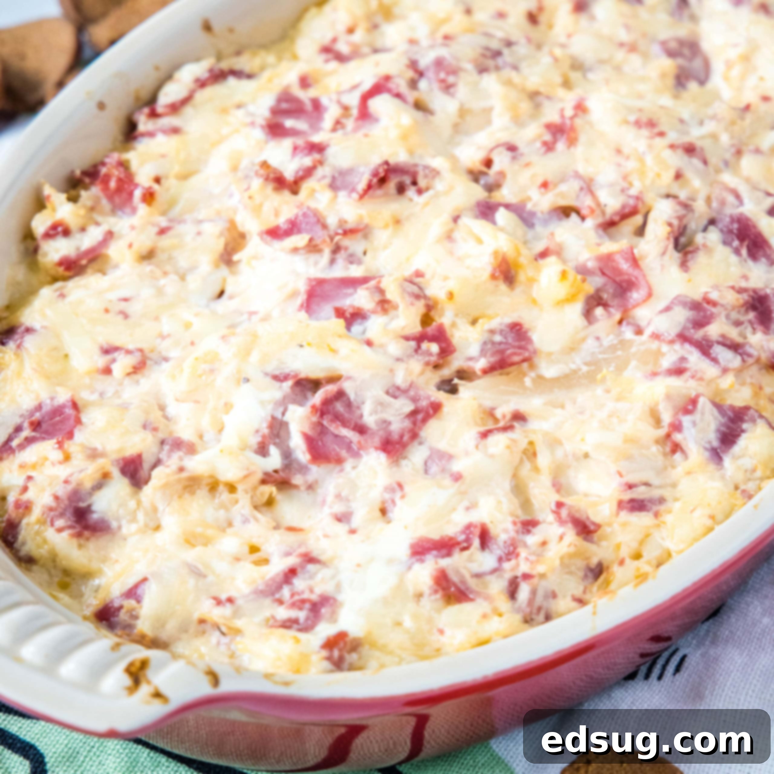 Kickoff Comfort Food 15 Close up of a hearty Reuben Dip in a bowl, perfect for game day