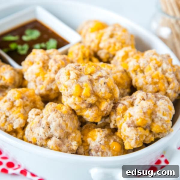 Kickoff Comfort Food 29 Cropped close up of delicious cream cheese sausage balls, golden brown