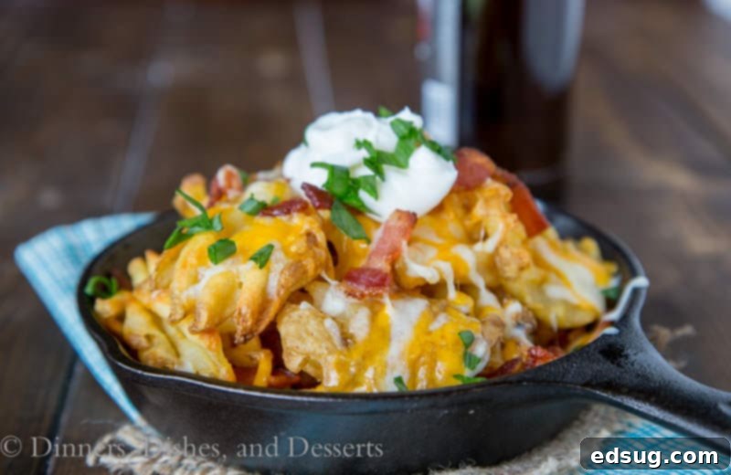 Kickoff Comfort Food 26 Idaho Nachos loaded with crispy waffle fries, bacon, and melted cheese