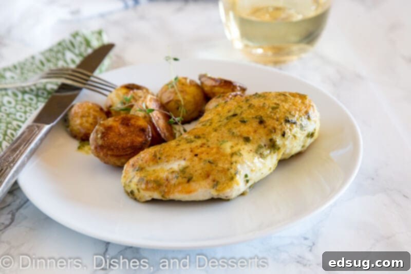 One-Pan Chicken and Potatoes 3 Close-up of roasted sheet pan chicken and potatoes served on a plate