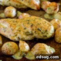 One-Pan Chicken and Potatoes 7 Sheet pan chicken with potatoes on a pan for the recipe card