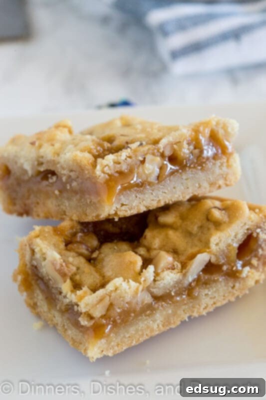 salted caramel crumble bars on a plate, golden brown and irresistible